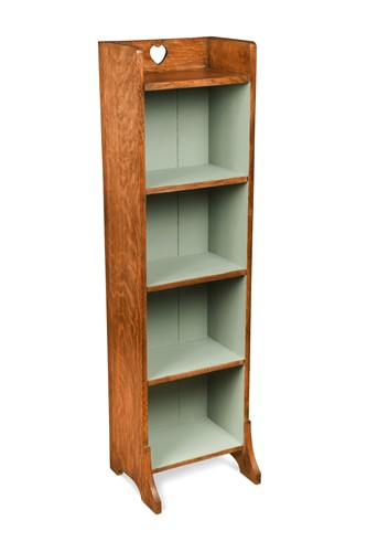Lot 212 - A small Arts and Crafts oak bookcase in the manner of Liberty, circa 1910