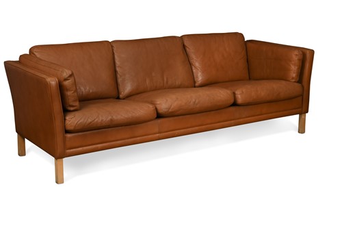 Lot 278 - A Danish brown leather three-seat sofa