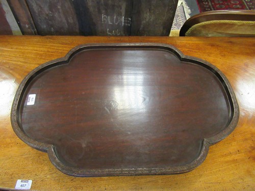 Lot 178 - A Chinese carved wood lobed tray, early to mid 20th century