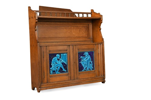 Lot 206 - Attributed to Liberty & Co., an Arts & Crafts oak hanging cupboard