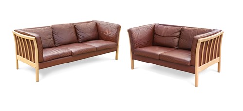 Lot 283 - Stouby, a Danish conker brown leather three-seat sofa and another two-seat sofa