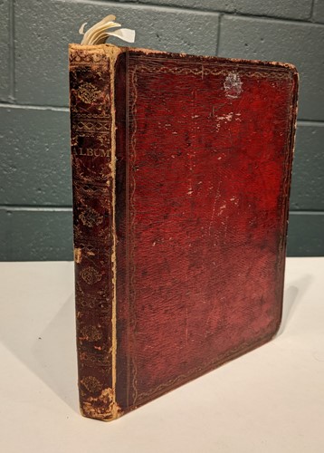 Lot 360 - A Regency red leather commonplace album, dated...