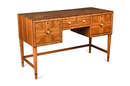 Lot 246 - An English Art Deco parquetry decorated desk by Bath Cabinet Makers, circa 1925
