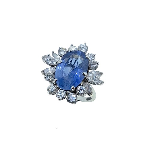 Lot 245 - A sapphire and diamond cluster ring