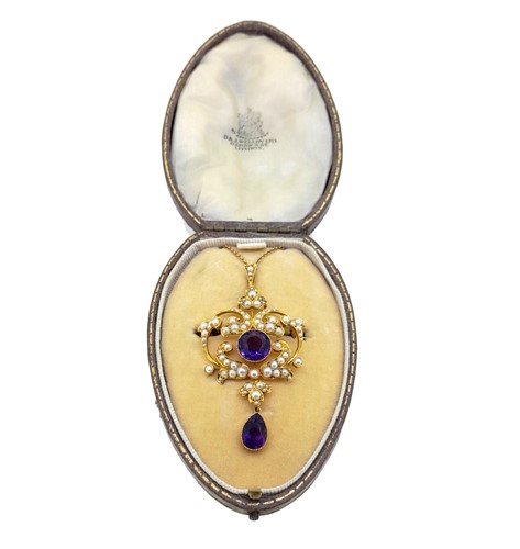 Lot 59 - An amethyst and split pearl pendant/brooch and chain