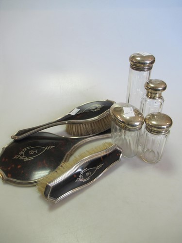 Lot 224 - A collection of 4 silver topped glass...
