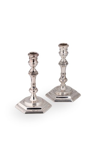 Lot 528 - A pair of mid 20th century cast silver candlesticks