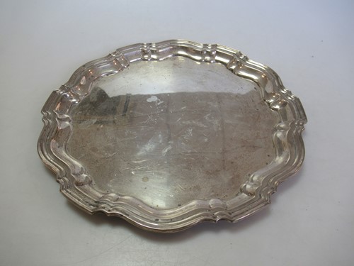 Lot 223 - A silver salver 15.3ozt; together with two...