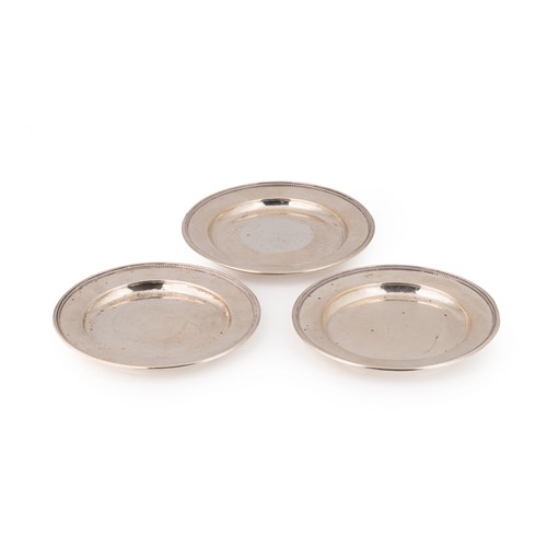 Lot 456 - A trio of early 20th century Danish metalwares silver side plates, mark of Georg Jensen