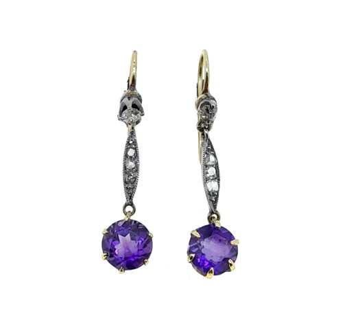 Lot 65 - A pair of early 20th century amethyst and diamond ear pendants