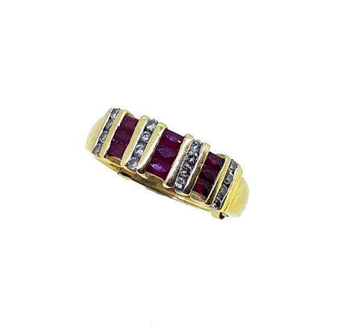 Lot 38 - A modern ruby and diamond ring