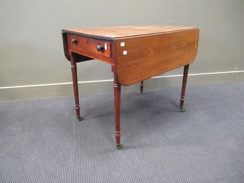 Lot 389 - A Regency mahogany Pembroke table, with knob...