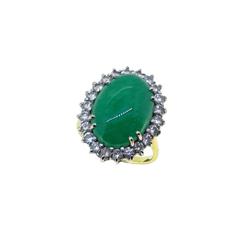 Lot 174 - An 18ct gold jade and diamond cluster ring
