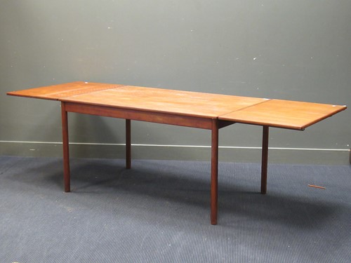 Lot 506 - A 1950’s hardwood rectangular dining table,...