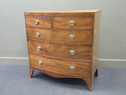 Lot 388 - A George III mahogany bow fronted chest of two...