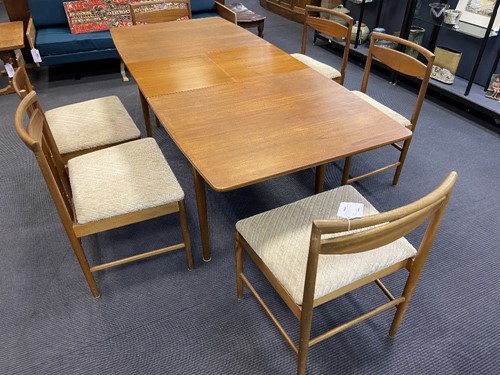 Lot 293 - Tom Robertson for A.H. McIntosh & Co., Kirkcaldy, a mid-Century teak dining table and six chairs