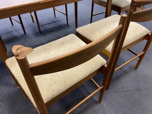 Lot 293 - Tom Robertson for A.H. McIntosh & Co., Kirkcaldy, a mid-Century teak dining table and six chairs