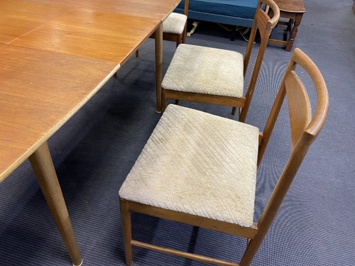 Lot 293 - Tom Robertson for A.H. McIntosh & Co., Kirkcaldy, a mid-Century teak dining table and six chairs