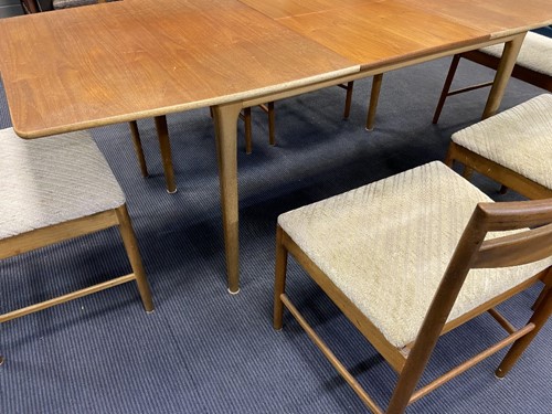 Lot 293 - Tom Robertson for A.H. McIntosh & Co., Kirkcaldy, a mid-Century teak dining table and six chairs