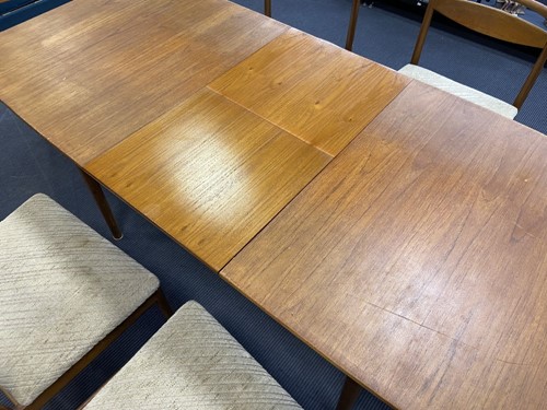 Lot 293 - Tom Robertson for A.H. McIntosh & Co., Kirkcaldy, a mid-Century teak dining table and six chairs