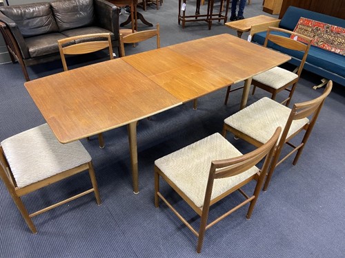 Lot 293 - Tom Robertson for A.H. McIntosh & Co., Kirkcaldy, a mid-Century teak dining table and six chairs