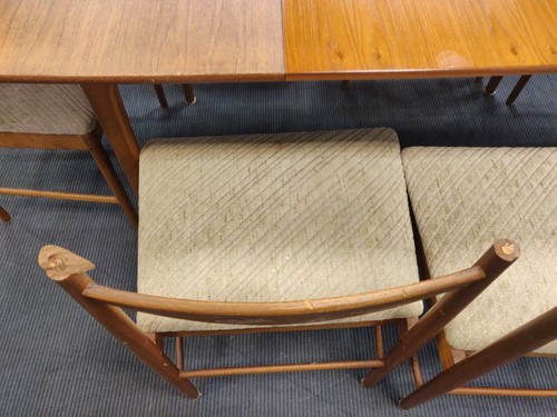 Lot 293 - Tom Robertson for A.H. McIntosh & Co., Kirkcaldy, a mid-Century teak dining table and six chairs