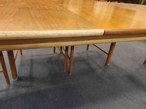 Lot 293 - Tom Robertson for A.H. McIntosh & Co., Kirkcaldy, a mid-Century teak dining table and six chairs