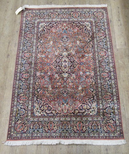 Lot 561 - A silk rug of Persian design, 194 x 125cm