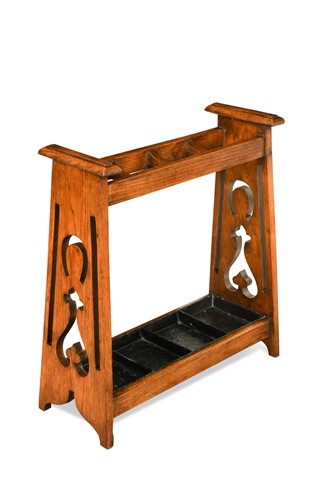 Lot 209 - An Arts & Crafts oak stick stand