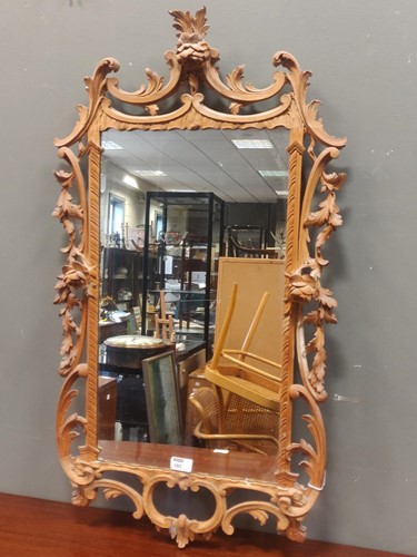 Lot 385 - A George III style carved pine Rococo design...