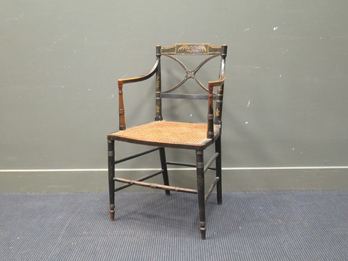 Lot 505 - A pair of Regency ebonised and gilt decorated...