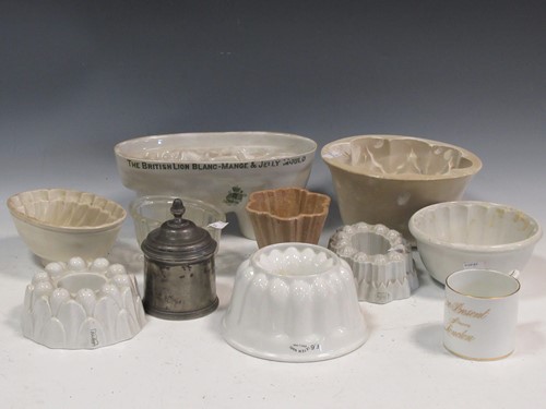Lot 101 - A collection of nine ceramic jelly moulds...