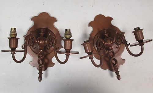 Lot 536 - A pair of Arts & Crafts copper twin branch...
