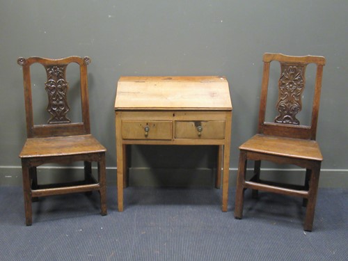 Lot 492 - Two similar 18th century carved oak side...
