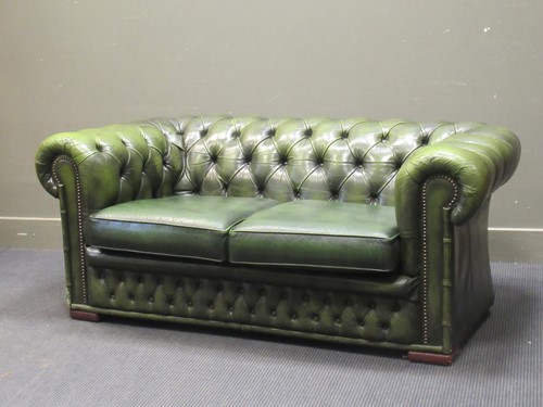 Lot 422 - A modern button back Chesterfield type two...