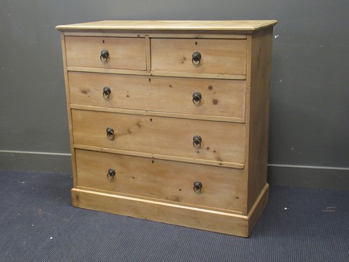 Lot 450 - A pine chest of two short over three long...