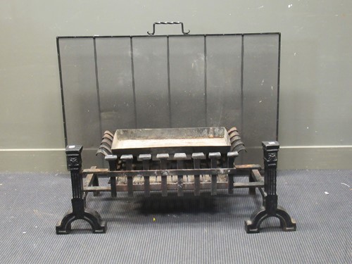 Lot 446 - A metal fire grate with later andirons...