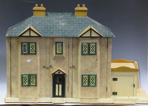 Lot 118 - A circa 1940's dolls house with opening front,...