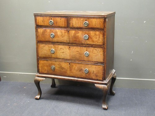 Lot 430 - A George III elm and banded chest of drawers...