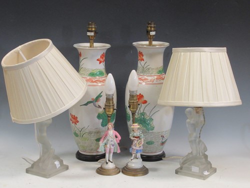 Lot 118 - A pair of Chinese ceramic lamps decorated with...