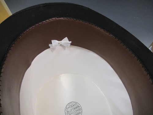 Lot 149 - Two top hats from James Locke & Co, St James...