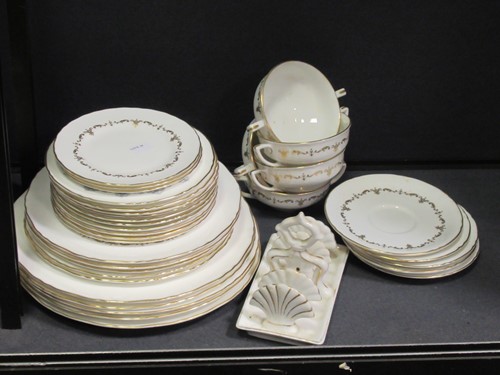 Lot 110 - A Royal Worcester 'Blue Medallion' dinner...