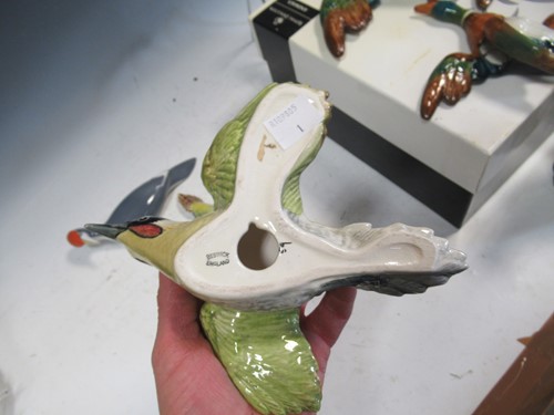 Lot 185 - A set of three Beswick flying Woodpeckers...