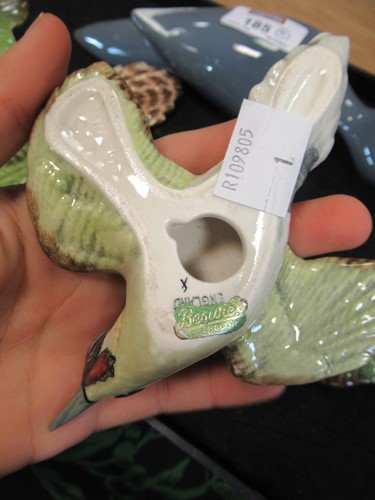 Lot 185 - A set of three Beswick flying Woodpeckers...
