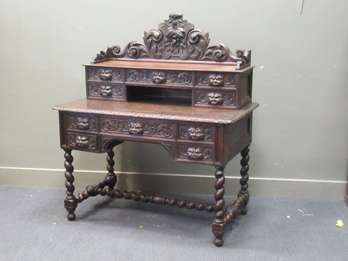 Lot 487 - A late Victorian carved oak desk 130 x 114 x 62cm