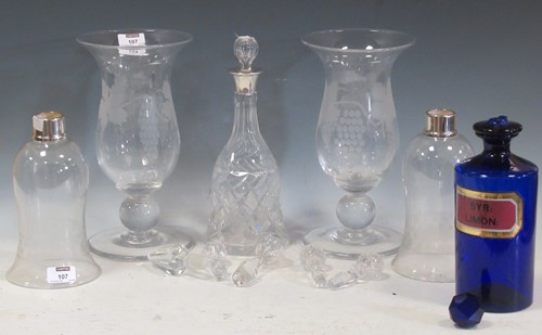 Lot 107 - Two engraved glass vases, together with two...