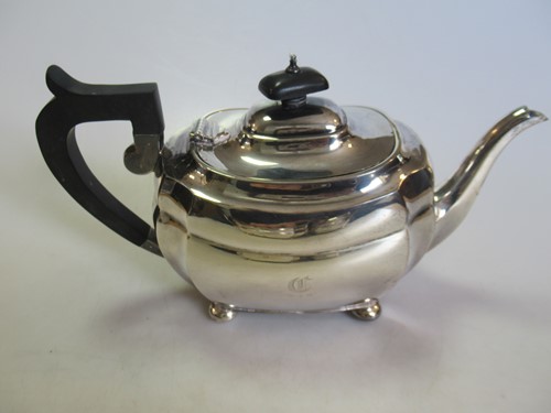 Lot 248 - A Chester silver three-piece tea set, gross...