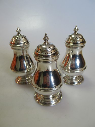 Lot 249 - Three silver pepper or spice casters, gross...