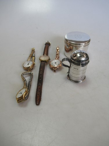 Lot 247 - A small silver tankard shaped caster, together...