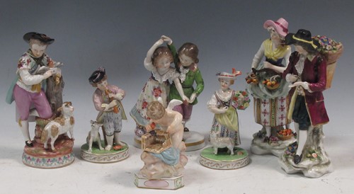 Lot 126 - A Meissen figure of cupid with bird cage, a...